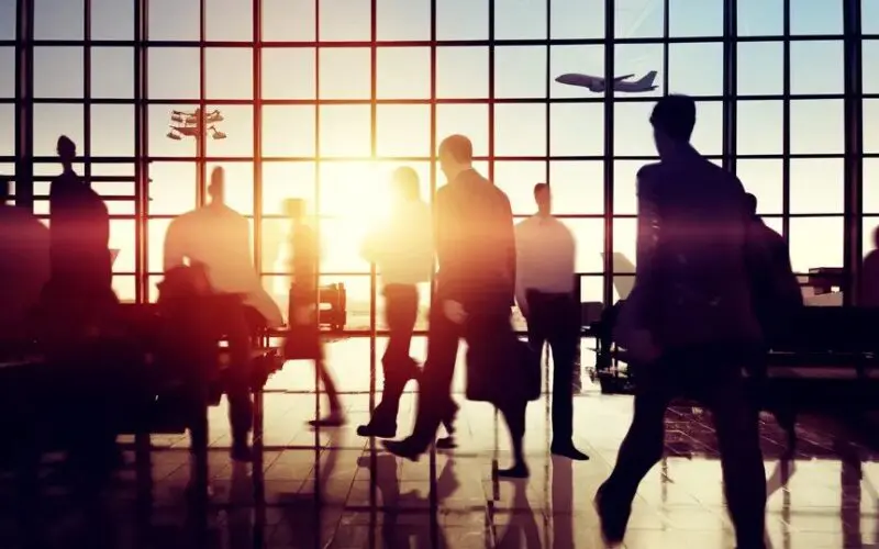 Business people travelling through the airport
