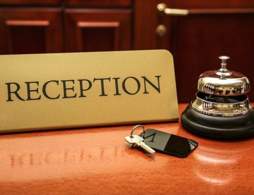 Reception name card, with service bell and room key.