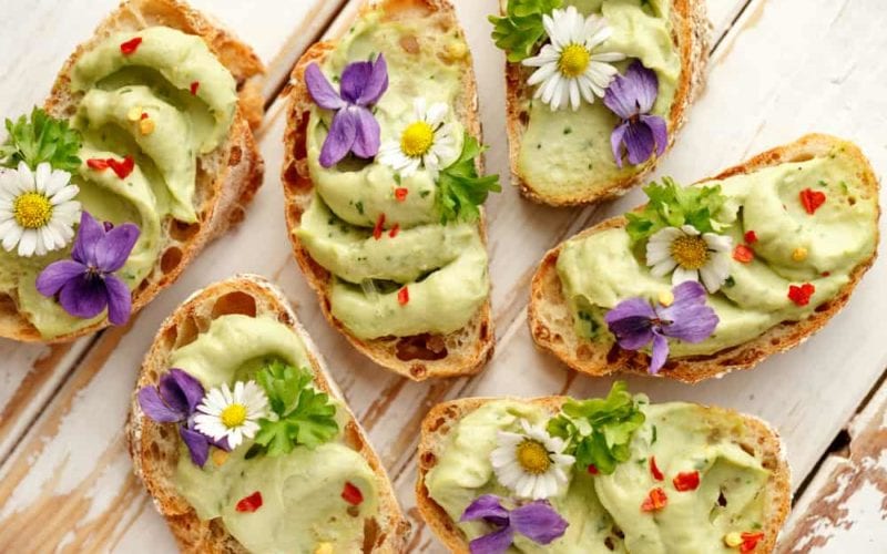 avocado toast canapes with edible flowers