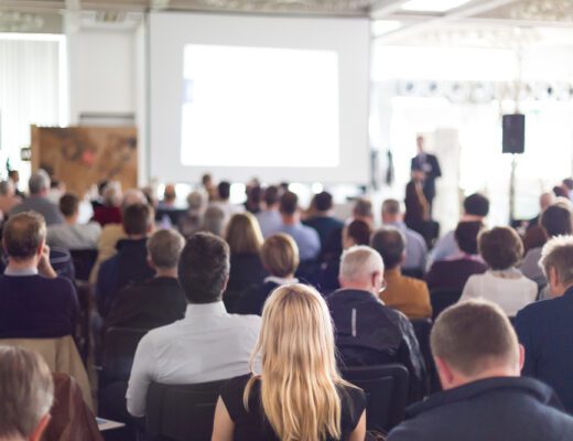 Speaker,Giving,A,Talk,At,Business,Meeting.,Audience,In,The